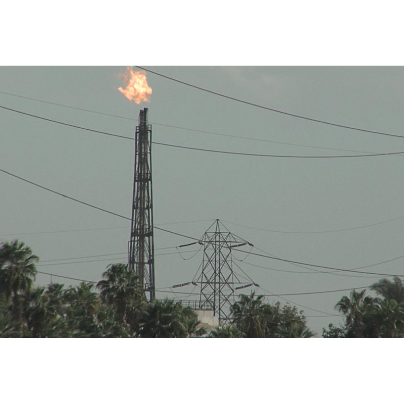 Egypt - Suez - industry - energetics - gas - fire - electricity - high voltage wires 