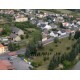 ČR - města - Tuchlovice - vesnice - letecké záběry - dron - domy - byty - rybník - výstavba